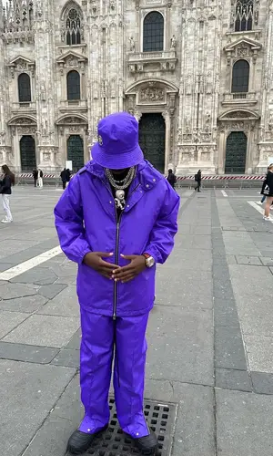 Lil Tjay wearing Moncler boots