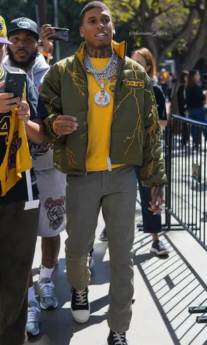 NLE Choppa wearing Born Fly sweatshirt