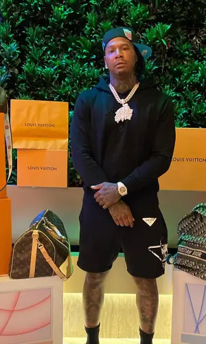 Moneybagg Yo wearing Dior backpack