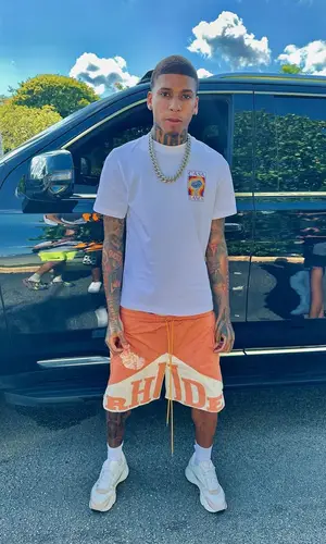 NLE Choppa wearing Rhude shorts