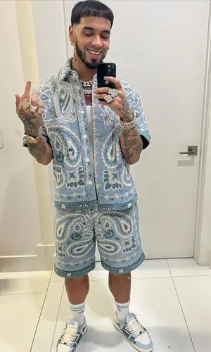 Anuel AA wearing Amiri shirt
