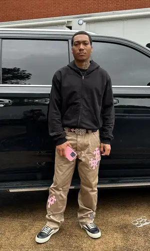 Lil Meech wearing Chrome Hearts belt