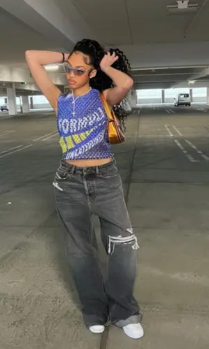 Jodie Woods wearing Diesel bag