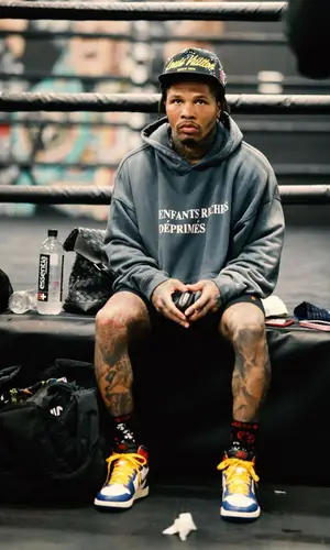 Gervonta Davis’ Outfit in Enfants Riches Deprimes Hoodie, Louis Vuitton Cap & Chrome Hearts Socks (2023)