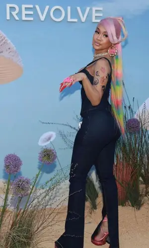 Saweetie wearing EB Denim pants