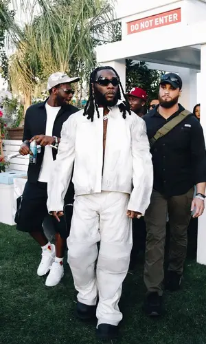 Burna Boy wearing Balenciaga jacket