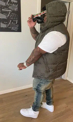 Rod Wave wearing Gucci jacket
