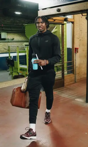 Tyrese Maxey’s Outfit in New Balance Hoodie & Gucci Bag (2023)