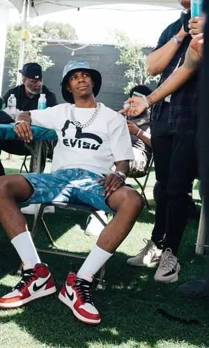 A Boogie Wit Da Hoodie wearing Evisu t-shirt