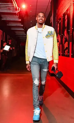 Dejounte Murray wearing Louis Vuitton jacket