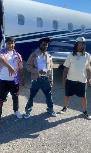 Tadoe wearing Amiri shirt