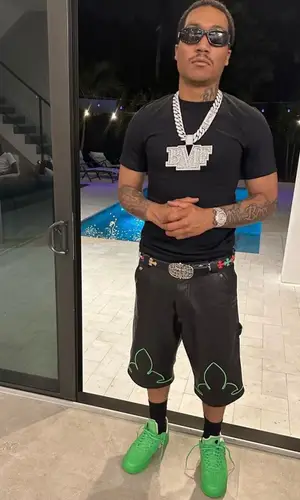 Lil Meech wearing Chrome Hearts belt