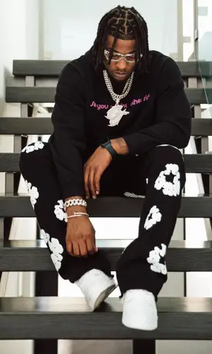 CJ So Cool wearing Travis Scott Merch hoody