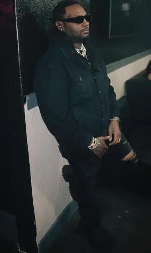 Peezy wearing Bottega Veneta belt