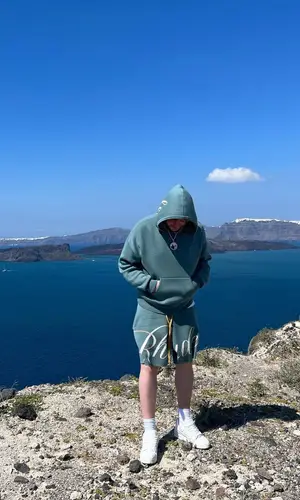 Murda Beatz wearing Rhude shorts