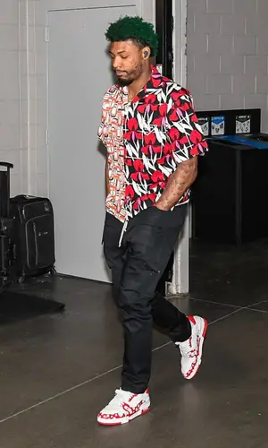 Marcus Smart wearing Prada shirt