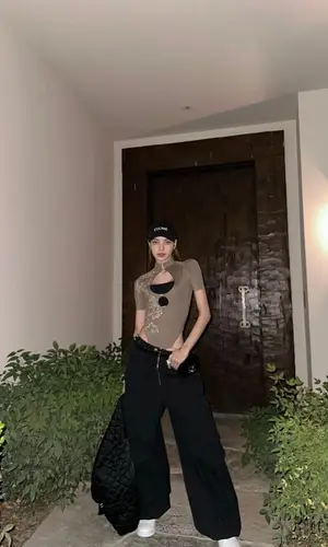Lisa wearing Celine cap