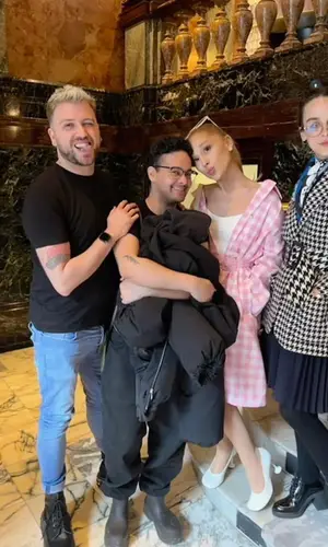 Ariana Grande’s Outfit in Prada Jacket, Alexander McQueen T-Shirt & Alaïa Eyewear (2023)