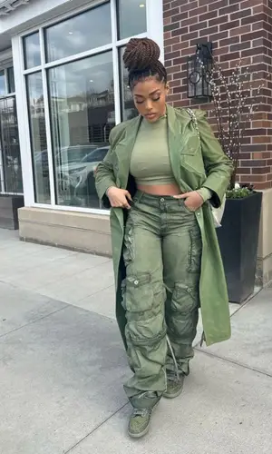 Jordyn Woods’ Outfit in The Attico Pants, Nike Sneakers & Chanel Bag (2023)