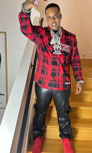 Finesse2tymes wearing Sauce Avenue shirt