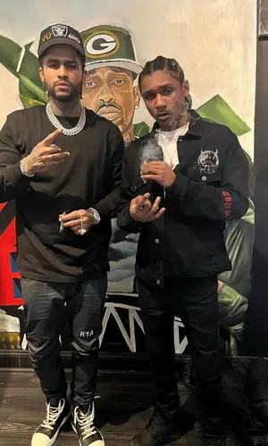 Dave East wearing New Era cap