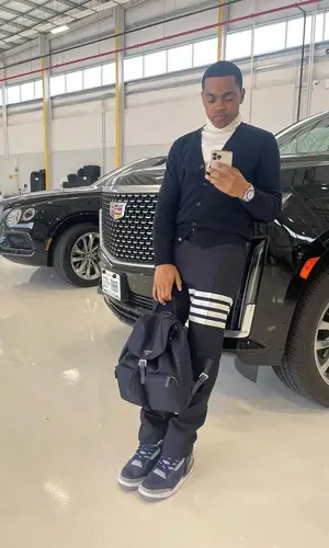 Michael Rainey Jr. wearing Prada backpack