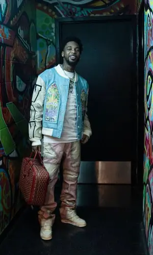 Key Glock wearing Goyard bag