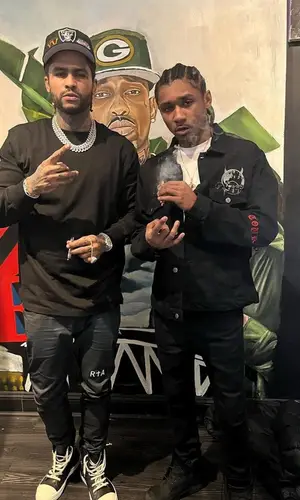 Dave East wearing New Era cap