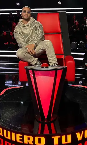 Prince Royce wearing Palm Angels hoody