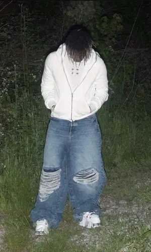 Ken Carson’s Outfit in Rick Owens Hoodie, Vetements Jeans & New Rock Sneakers (2023)