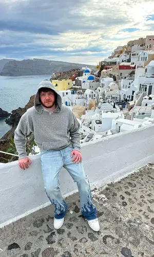 Murda Beatz wearing Saint Laurent hoody