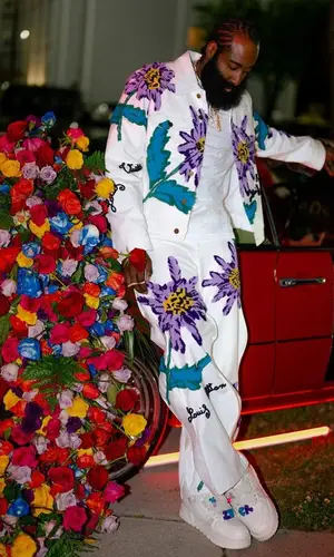 James Harden wearing Louis Vuitton pants