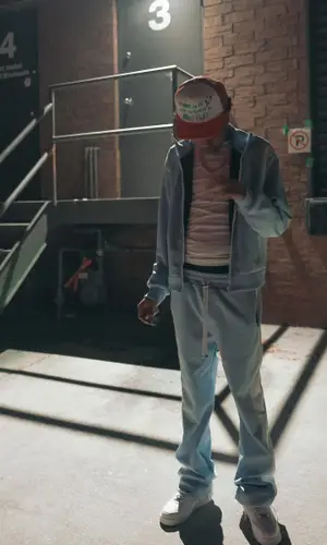 Lil Poppa wearing Chrome Hearts cap