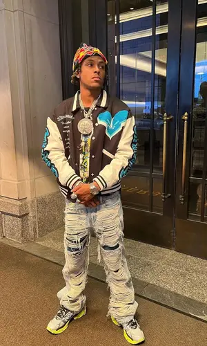 Rich The Kid wearing Stainbandzstudios hat