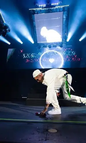 Sfera Ebbasta wearing Kenzo scarf
