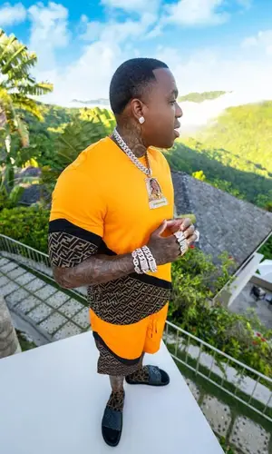BandMan Kevo wearing Fendi shorts