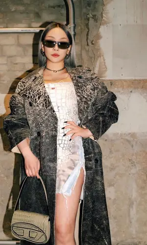 CL wearing Diesel eyewear