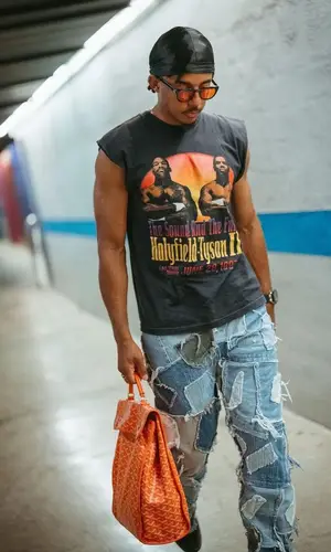 Jules Kounde wearing Goyard backpack