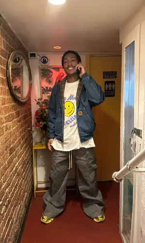 Lil Meech wearing Carhartt jacket