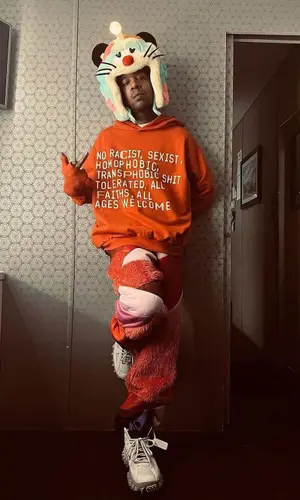 Kid Cudi’s Outfit in Cactus Plant Flea Market Hoodie, Nike Sneakers & Off-White (2023)