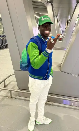 Bobby Shmurda wearing Soho Youth Club cap