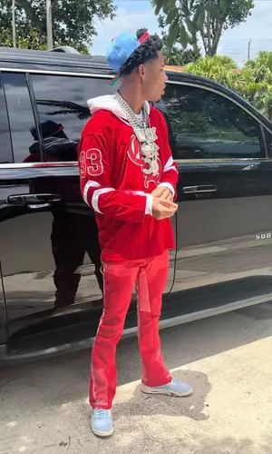 Nardo Wick wearing Mitchell & Ness cap