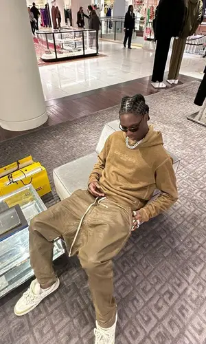 Jnr Choi’s Outfit in Maison Margiela Hoodie & Louis Vuitton Sneakers (2023)