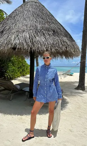 Sofia Richie wearing Prada shirt