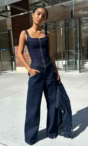 Yara Shahidi wearing EB Denim jeans