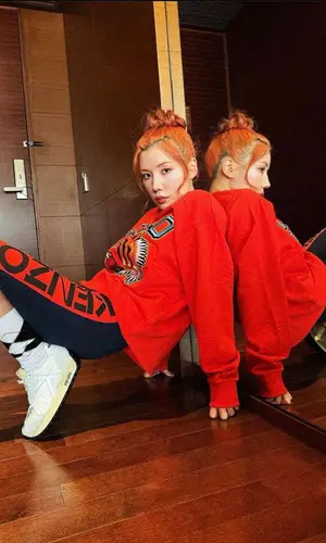 Riisa Naka wearing Kenzo sweatshirt