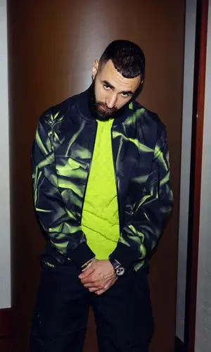 Karim Benzema wearing Louis Vuitton sweater