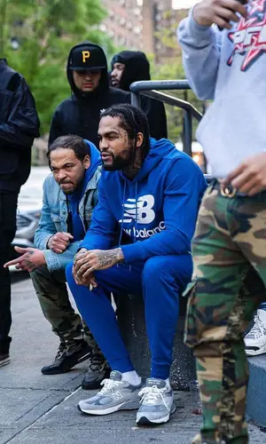 Dave East wearing New Balance pants