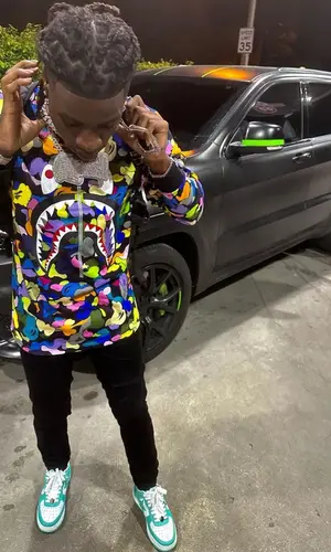 SleazyWorld Go wearing Bape t-shirt