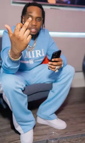 Fivio Foreign wearing Amiri sweatshirt
